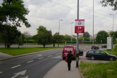 Tablice kierunkowe na słupach Itaka